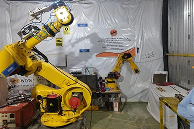 A WO robot cell built and fenced at the workshop